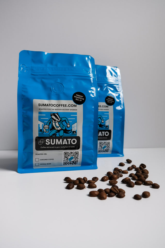 Two Sumato Coffee bags with roasted beans on a white background – freshly roasted specialty coffee, available as whole bean or ground