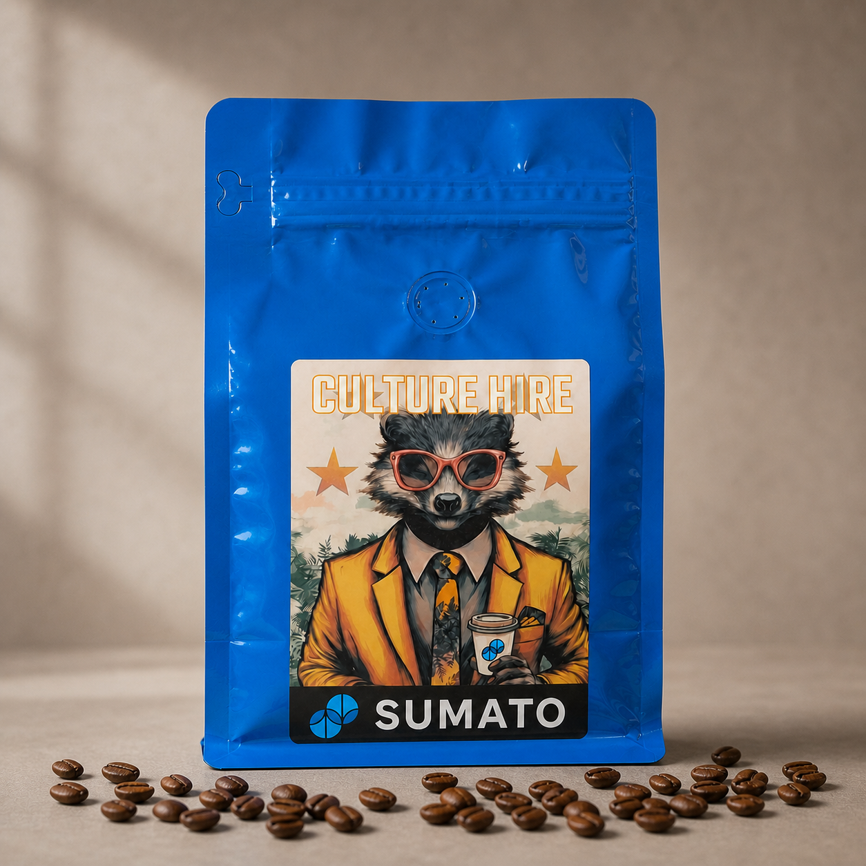 Culture Hire Sumato Coffee in a blue bag with roasted coffee beans