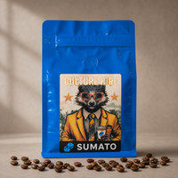 Culture Hire Sumato Coffee in a blue bag with roasted coffee beans
